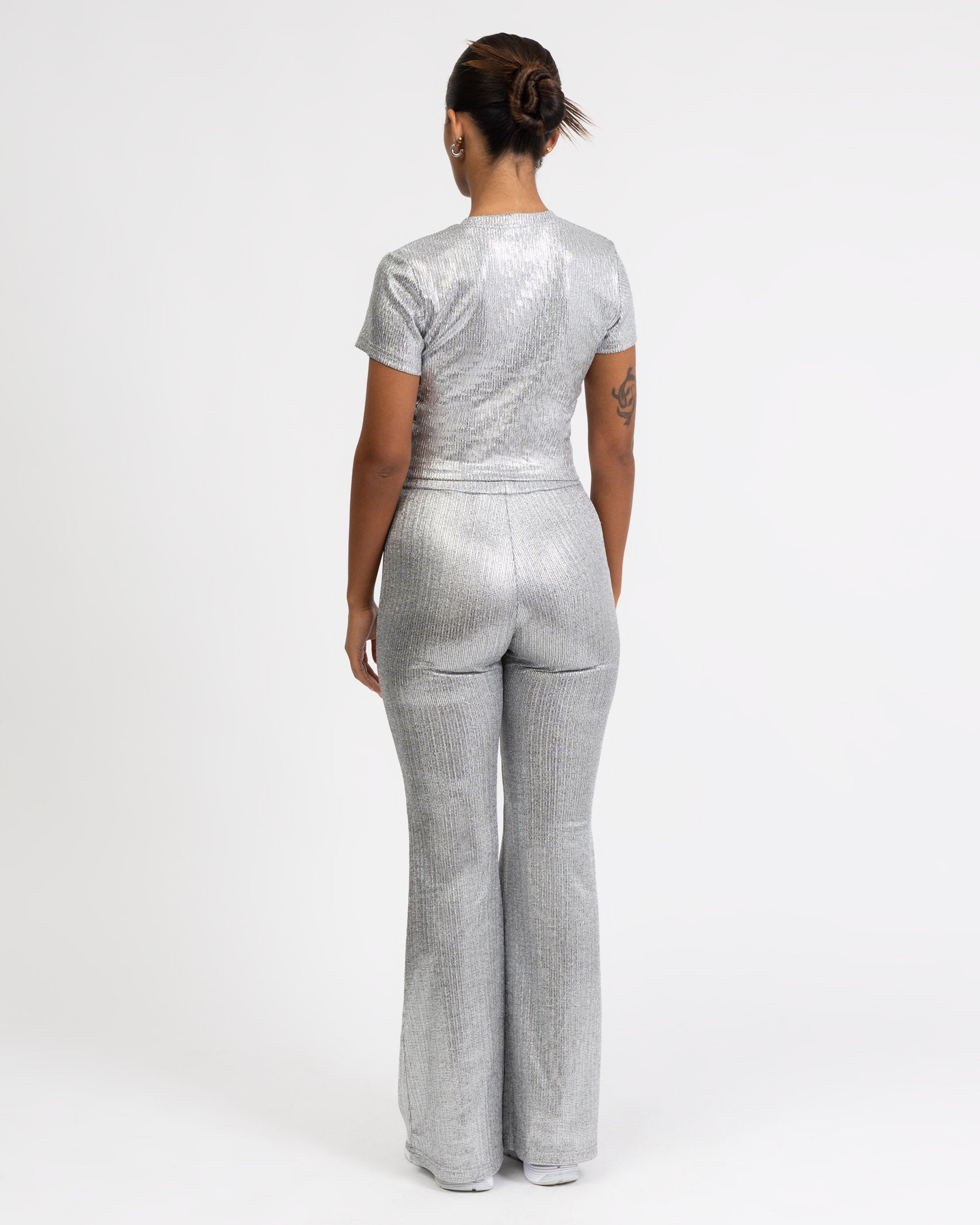 Glitzernde Hose mit Schlag