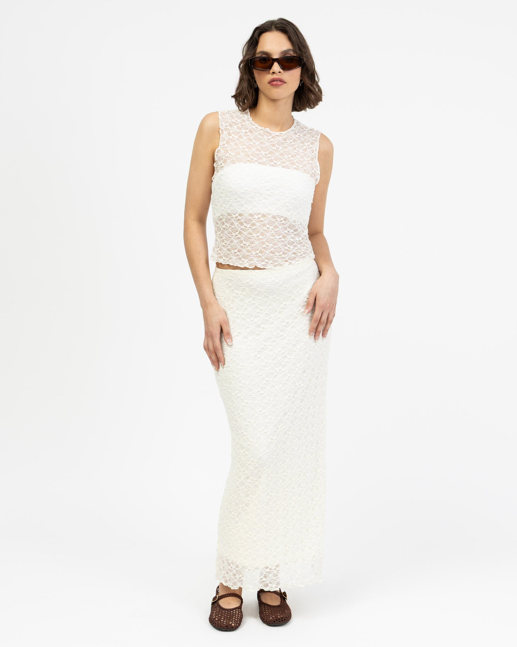 Spitzentop mit Blumenstruktur