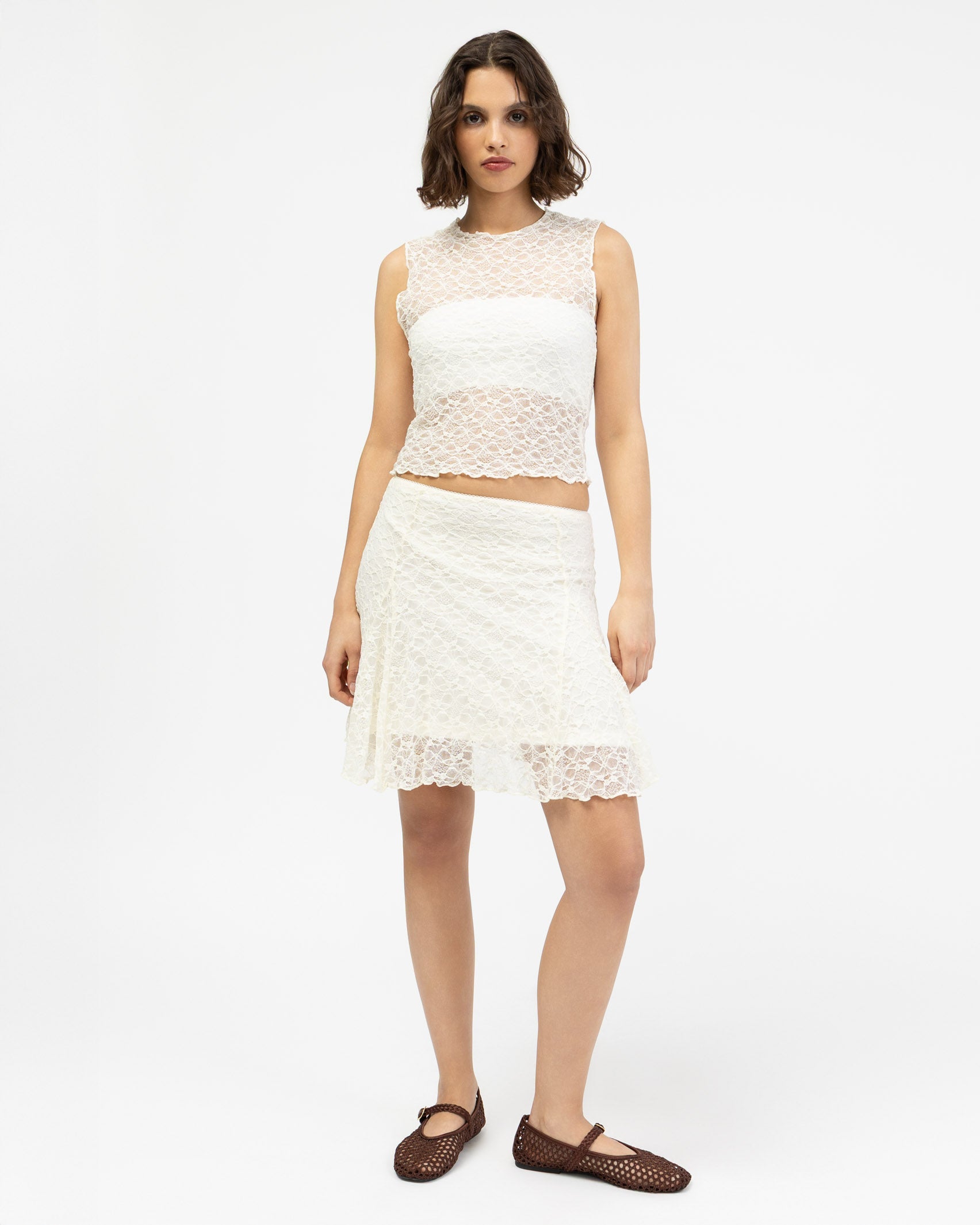 Asymmetrischer Spitzenrock mit Blumenstruktur