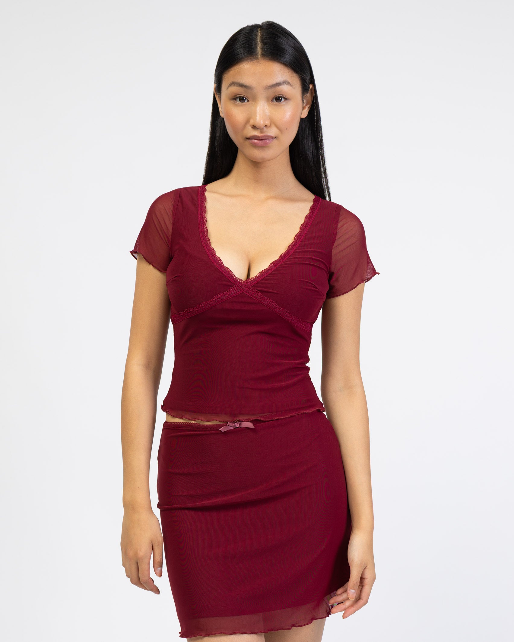 Mesh Minirock mit Spitzdendetail von vorne