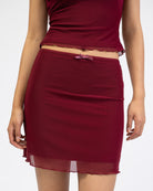 Mesh Minirock mit Spitzdendetail im Detail