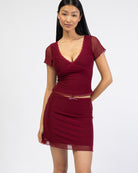 Mesh Minirock mit Spitzdendetail von vorne