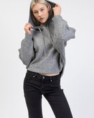 Pullover Poncho mit Kapuze im Detail