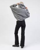 Pullover Poncho mit Kapuze von hinten