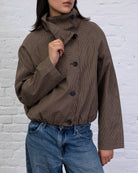 Jacke mit asymmetrischer Knopfleiste