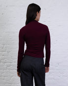 Asymmetrisches Langarmshirt mit Knöpfen