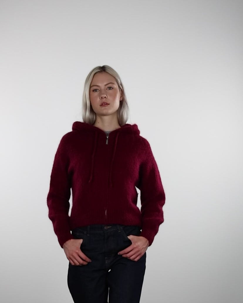 Strickjacke mit Reißverschluss und Kapuze Im Laufen 