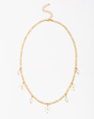 Flache Gliederkette mit Gänseblümchen Perlen - Broke + Schön#farbe_gold-colored