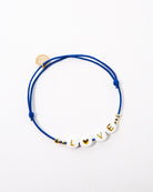 Gummi-Armband verziert mit Perlen - Broke + Schön#farbe_dunkelblau