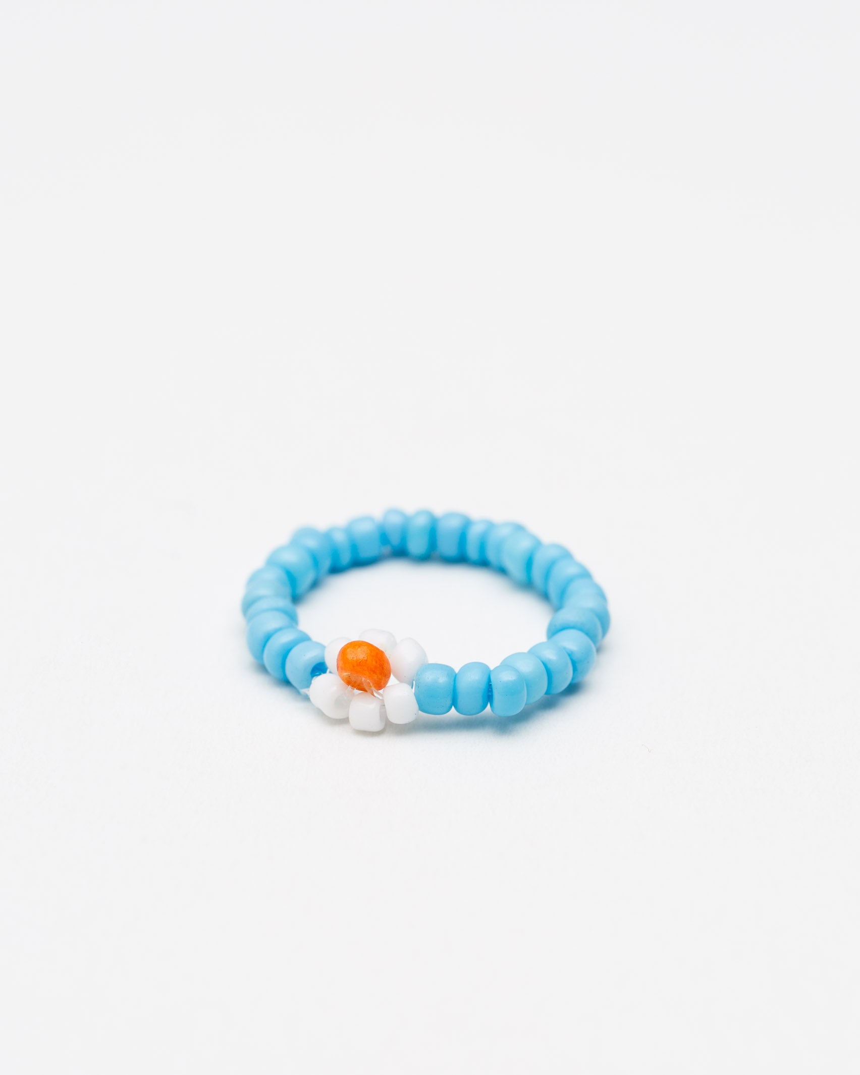 Elastischer Daisy-Ring aus Perlen- Broke + Schön#farbe_shiny-blue