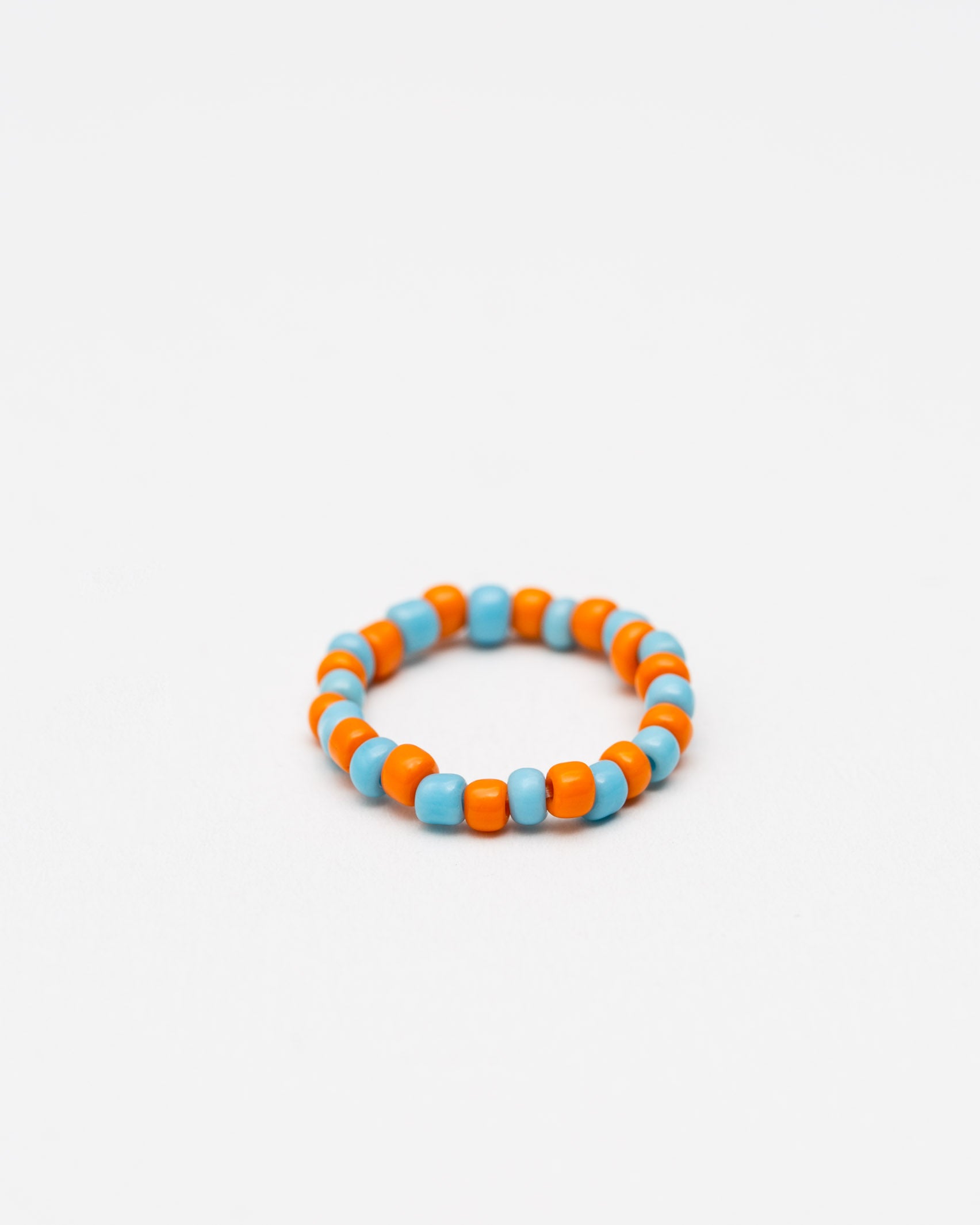 Elastischer Ring aus Perlen- Broke + Schön#farbe_shiny-orange