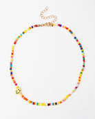 Perlenkette mit Perle eines grinsenden Emoticons - Broke + Schön#farbe_bright-yellow